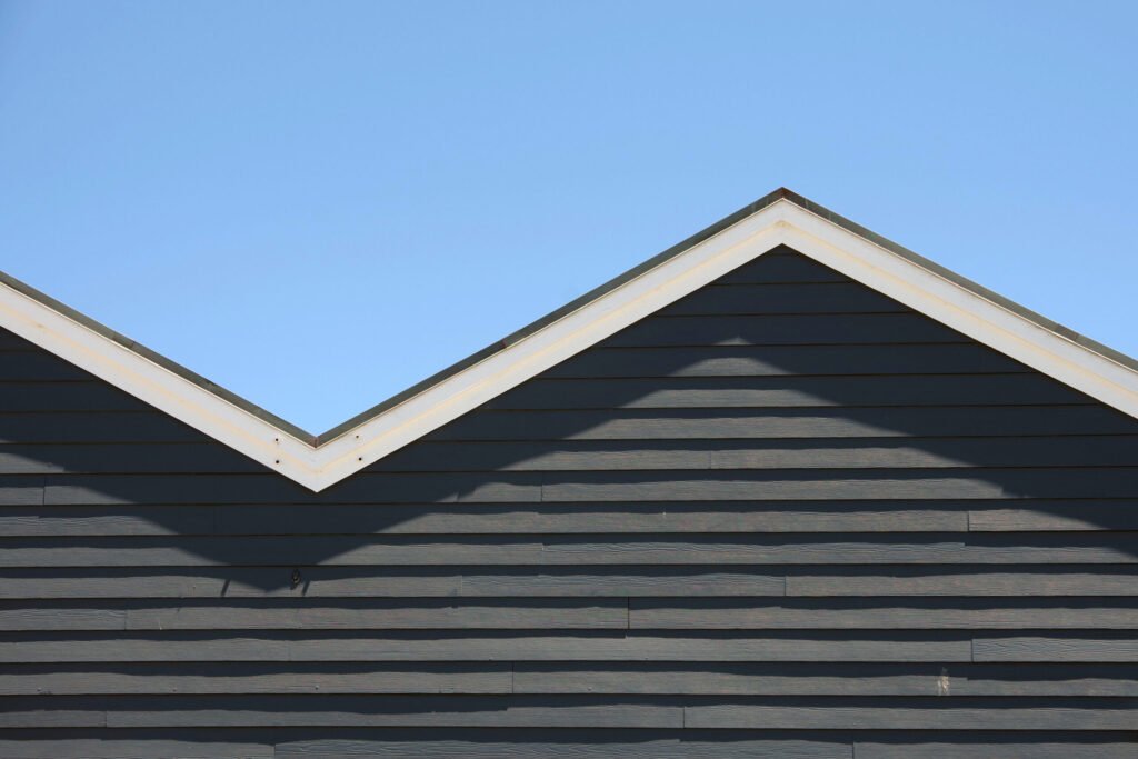 Different Types of Roofs - M-shaped roof front under blue sky